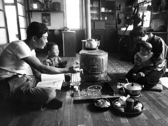 Family relaxing in their living-room, Hokkaido region, Japan, 1963.