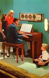 Family with a Wurlitzer 4040 organ, De Kalb, Illinois, USA, 1964.