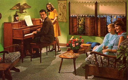 Family with a Wurlitzer model 2620 piano, USA, 1964.