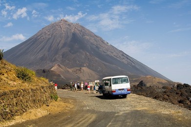 Tourists and the volcano of Pico de Fogo in the background, Fogo (Fire), Cape Verde Islands, Africa