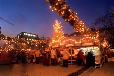 Christmas decoration at market on namesti Miru (square) at twilight, Vinohrady, Prague, Czech Republic, Europe
