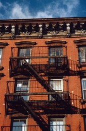 Detail of building with fire escape, Manhattan, New York City, United States of America, North America
