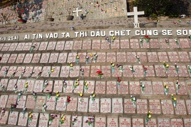 Graves containing cremation ashes in the wall of Nha Trang Cathedral, Vietnam, Indochina, Southeast Asia, Asia