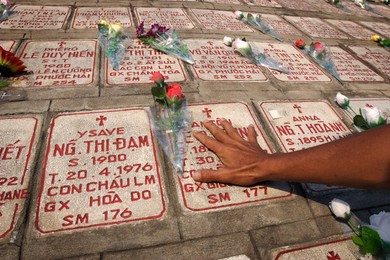 Graves containing cremation ashes in the wall of Nha Trang Cathedral, Vietnam, Indochina, Southeast Asia, Asia