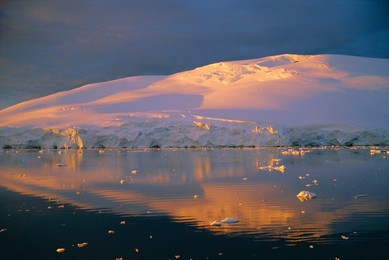 Coastal landscape lit by the midnight sun, Antarctic Peninsula, Antarctica