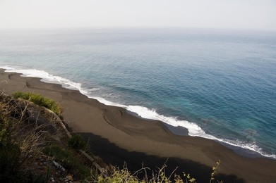 Black volcanic sand beach at Sao Filipe, Fogo (Fire), Cape Verde Islands, Atlantic Ocean, Africa