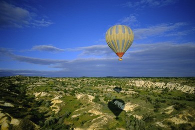 Hot air ballooning above Cappadocian landscape, Cappadocia, Anatolia, Turkey, Asia Minor, Asia