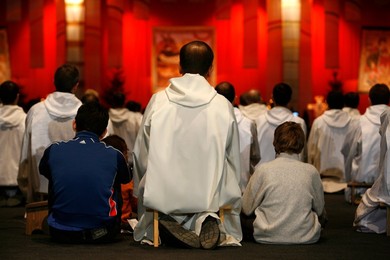 Prayer at Taize meeting, Geneva, Switzerland, Europe