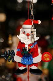 Close-up of Santa Claus decoration in shop at the Christmas market in Munich winter garden, Munich, Bavaria, Germany, Europe