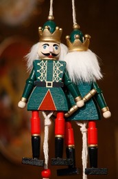 Close-up of painted wooden figures at shop in the Christmas market in Munich winter garden, Munich, Bavaria, Germany, Europe