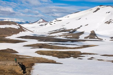 Walkers in mountain landscape covered with ice, Snaefellsjokull National Park, Iceland, Polar Regions
