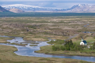 Church in lake landscape, Pingvellir, Iceland, Polar Regions