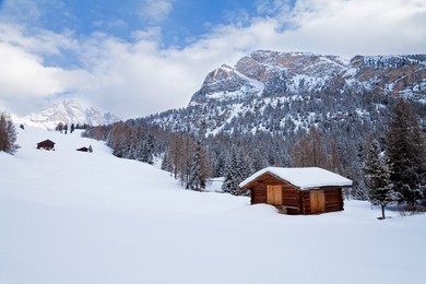 Mountain hut and landscape covered in winter snow, Val Gardena, Dolomites, South Tirol, Trentino-Alto Adige, Italy, Europe