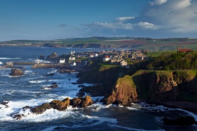 A view of the village of St. Abbs taken from Starney Bay, St. Abb's Nature Reserve, Berwickshire, Scotland, United Kingdom, Europe