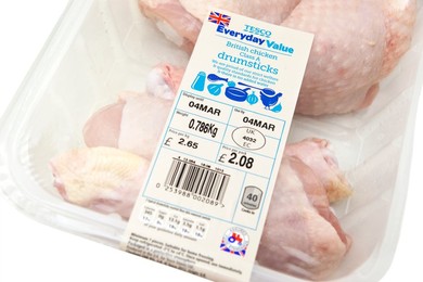 Pack of Tecso Everyday Value BRITISH chicken drumsticks with signs / logos of British farm standard logo from the assured food standards association of the little red tractor symbol & the Britsh union jack (strict welfare & quality standards)