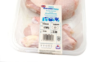 Pack of Tecso Everyday Value BRITISH chicken drumsticks with signs / logos of British farm standard logo from the assured food standards association of the little red tractor symbol & the Britsh union jack (strict welfare & quality standards)