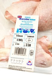 Pack of Tecso Everyday Value BRITISH chicken drumsticks with signs / logos of British farm standard logo from the assured food standards association of the little red tractor symbol & the Britsh union jack (strict welfare & quality standards)