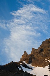 Clouds over the cirque ridge separating Royal Basin from Deception Basin, viewed from Royal Basin, Olympic National Park, Washington State, USA.