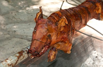 Cienfuegos Cuba pig roast on barbeque on fire for guests