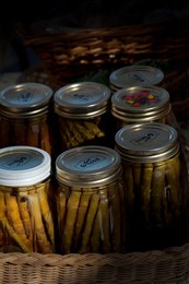 Farmer's Market: food, vendors and shoppers. Idaho. Canned organic asparagus