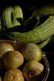 Farmer's Market: food, vendors and shoppers. Idaho. Organic cucumber.