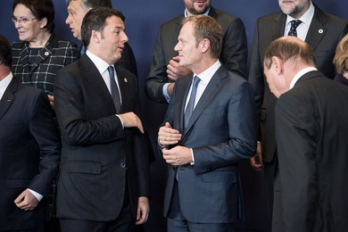 Italian Prime Minister Matteo Renzi (L)..........