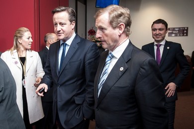 British Prime Minister David Cameron (L)..........