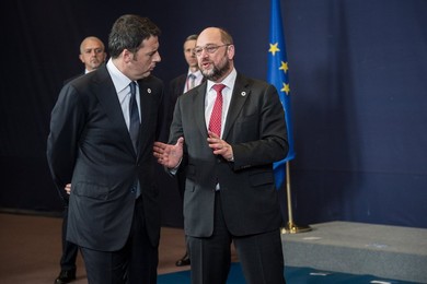 Italian Prime Minister Matteo Renzi (L)..........
