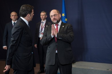 Italian Prime Minister Matteo Renzi (L)..........
