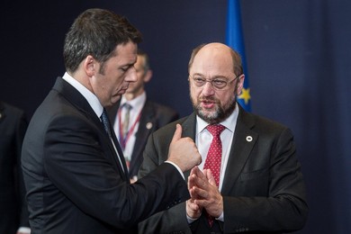 Italian Prime Minister Matteo Renzi (L)..........