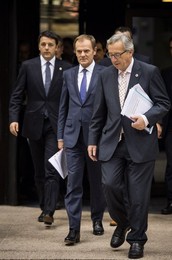 Italian Prime Minister Matteo Renzi (L)..........