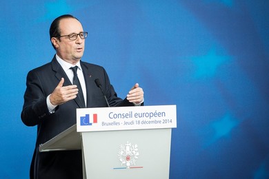 French President Francois Holland holds..........