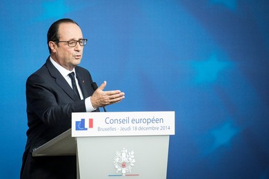 French President Francois Holland holds..........