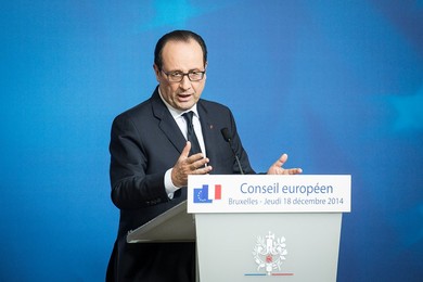 French President Francois Holland holds..........