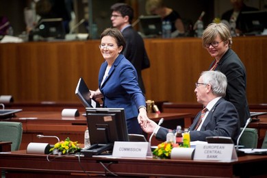 Polish Prime Minister Ewa Kopacz (L) is..........