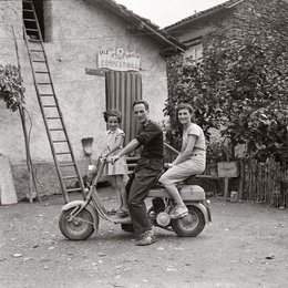FAMILY IN SCOOTER