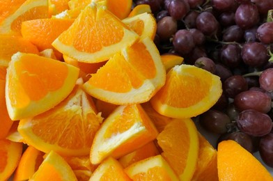 Orange and grapes Food background