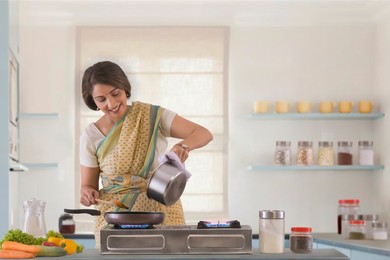 woman preparing food in kitchen