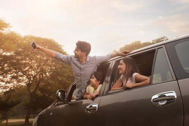 Family posing for the selfie in the nature during their excursion