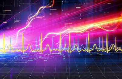 Abstract bright lights streaming across grid with wave pattern graph