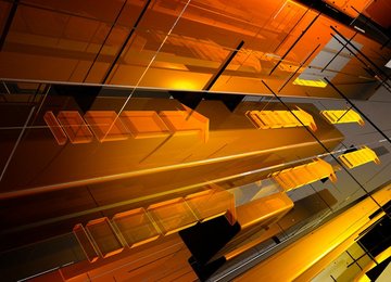 Abstract orange and yellow geometric arrow pattern