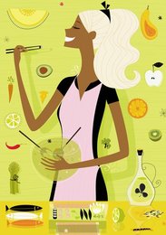 Woman cooking healthy food in kitchen