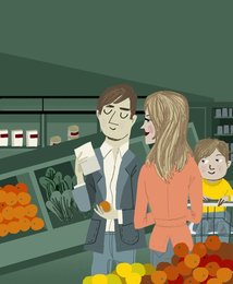 Family shopping together for groceries in supermarket
