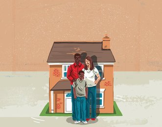 Happy family standing in front of new home