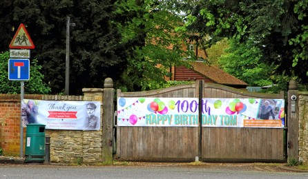 Happy 100th Birthday banner on the gates of The Old Rectory, where Captain Tom Moore lives with his family
Messages of Congratulations all around the village of Marston Moretaine, Bedfordshire, UK to celebrate the 100th Birthday of Captain Tom Moore.
'C