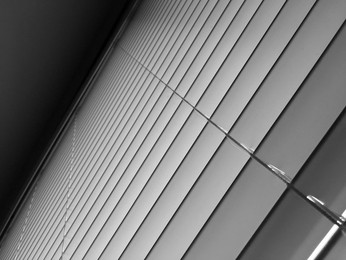 Low angle view of Venetian curtains abstract background and texture