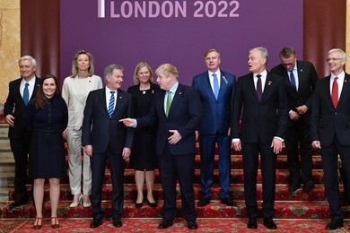 Britain's Prime Minister Boris Johnson (C) poses for a family photo with leaders of the the Joint Expeditionary Force (JEF), a coalition of 10 states focused on security in northern Europe, following their meeating, at Lancaster House, in London on March