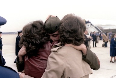 Former Iranian hostage SGT Rodney Sickman is welcomed home by his family.