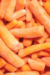Heap of frozen baby carrot. Food background