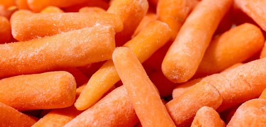 Heap of frozen baby carrot. Food background